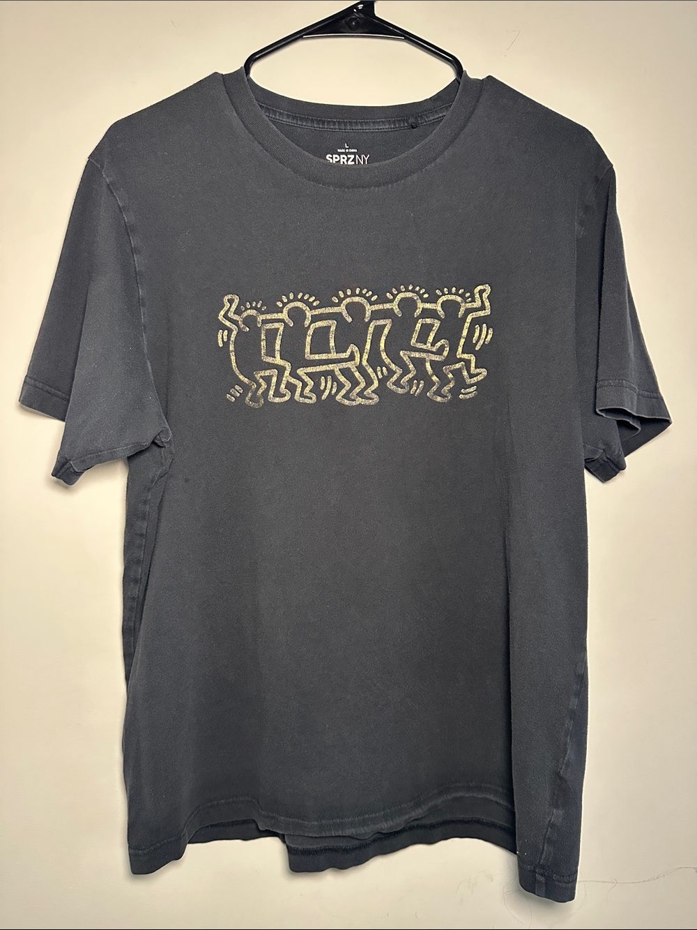 Keith Haring Uniqlo Graphic Black Tee with Gold Dancing Figures